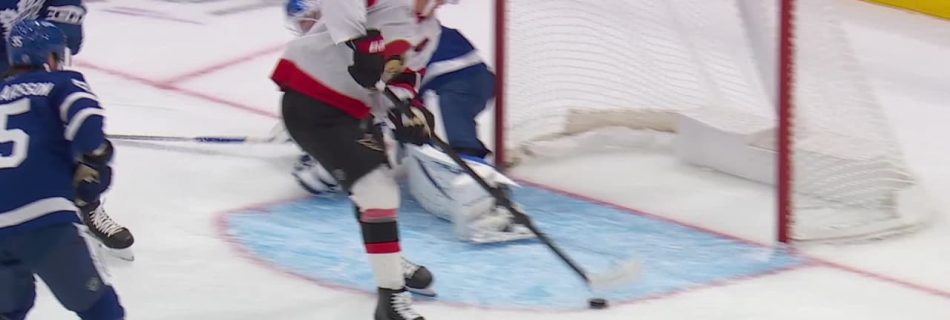 Stútzle drives to the net to open scoring