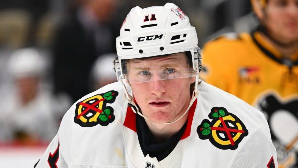 Moore signs 5-year, .25 million contract with Blackhawks Moore signs 5-year, .25 million contract with Blackhawks