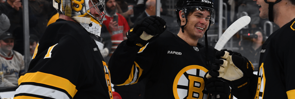 Bruins score three goals late, blank Rangers in season opener