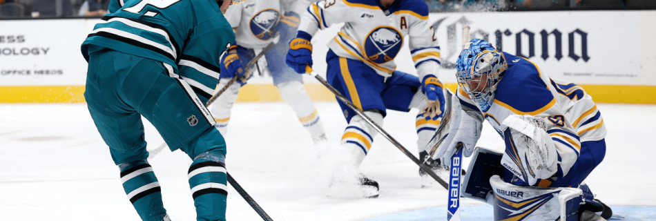 Ellis makes 23 saves, Sabres shut out Sharks to end three-game skid
