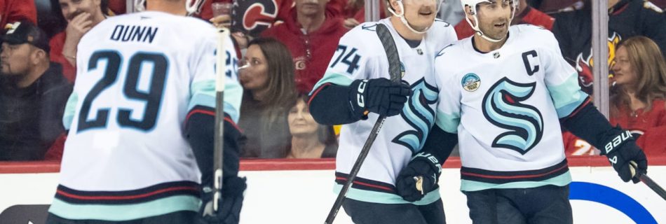 Kraken score six, cruise past Flames in season opener