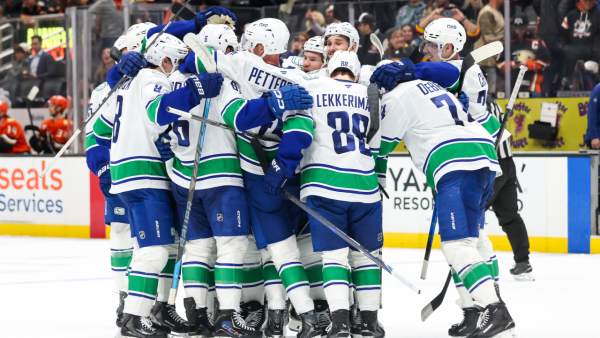 Canucks rally with three goals late, top Ducks in OT to end slide at 10 Canucks rally with three goals late, top Ducks in OT to end slide at 10
