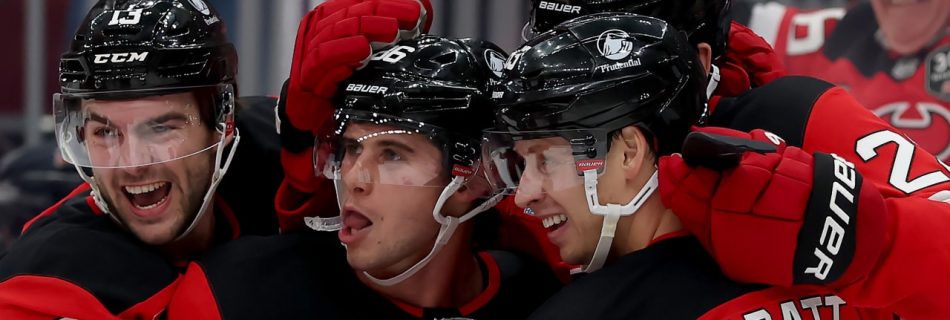 Hughes brothers lift Devils to season-opening OT win against Flyers