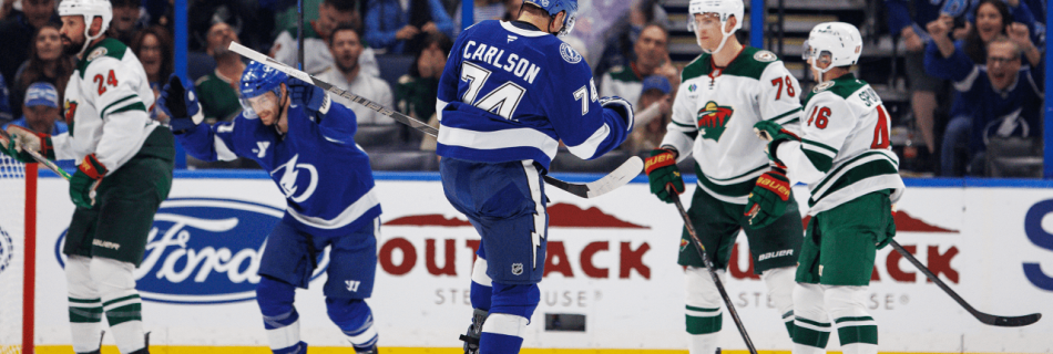 Carlson scores first two goals with Lightning, who hold off Wild