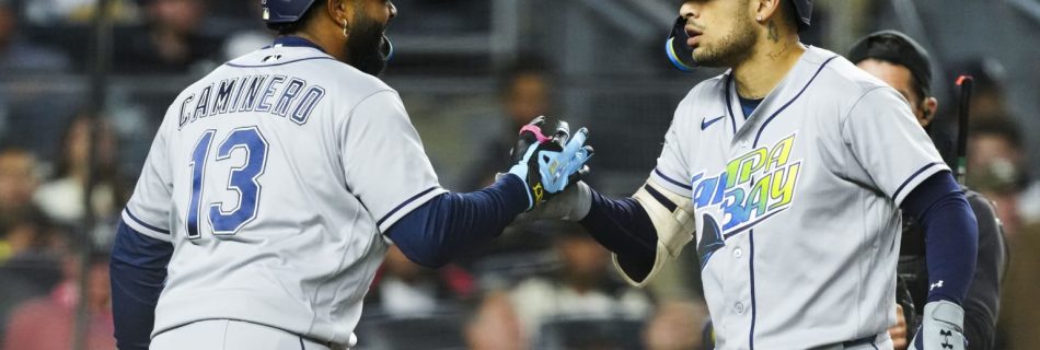 Rays sweep past Yankees in wild night in Bronx