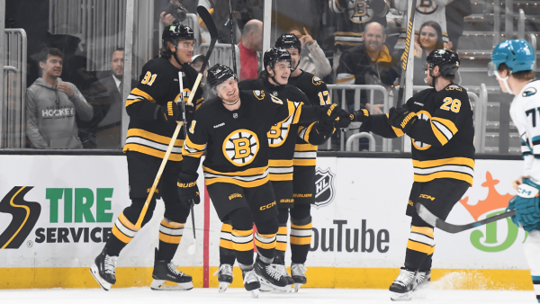 Bruins rally past Sharks in third, run point streak to eight