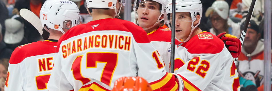 Pospisil breaks tie late, Flames edge Ducks for first win of season