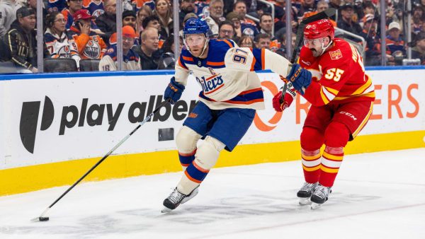 McDavid sets NHL season-opening assist streak mark, Oilers shut out Flames